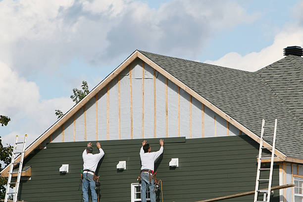 Professional Siding Contractor technician working in Rome, NY